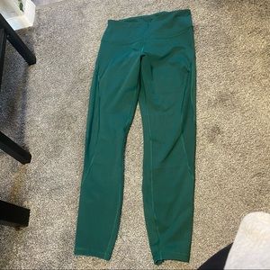 Emerald green elevate go dry leggings with mesh cut out